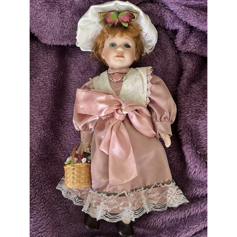 Porcelain 17in Doll Red Hair Green Eyes Pink Dress Bonnet Basket, 1 flaw. C desc